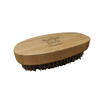 Kaylas Kurlz Organics Boar Skin Brush against a white background