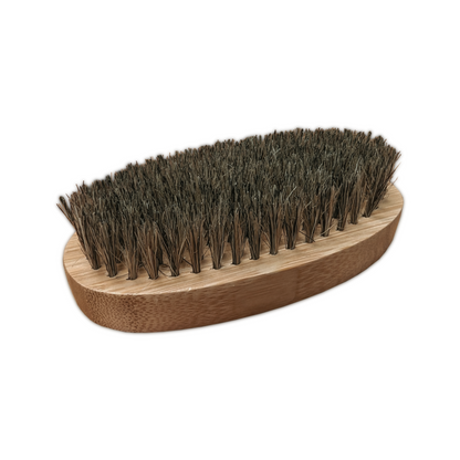 Kaylas Kurlz Organics Skin Brush. It is a wooden dry body brush with boar bristles, designed for exfoliating the skin.