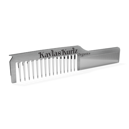 A Kaylas Kurlz Organics The Hairloom Stainless Dual Tooth Hair Architect Comb with dual teeth, engraved with the brand name Kayla's Kurlz Organics on the side against a white background.