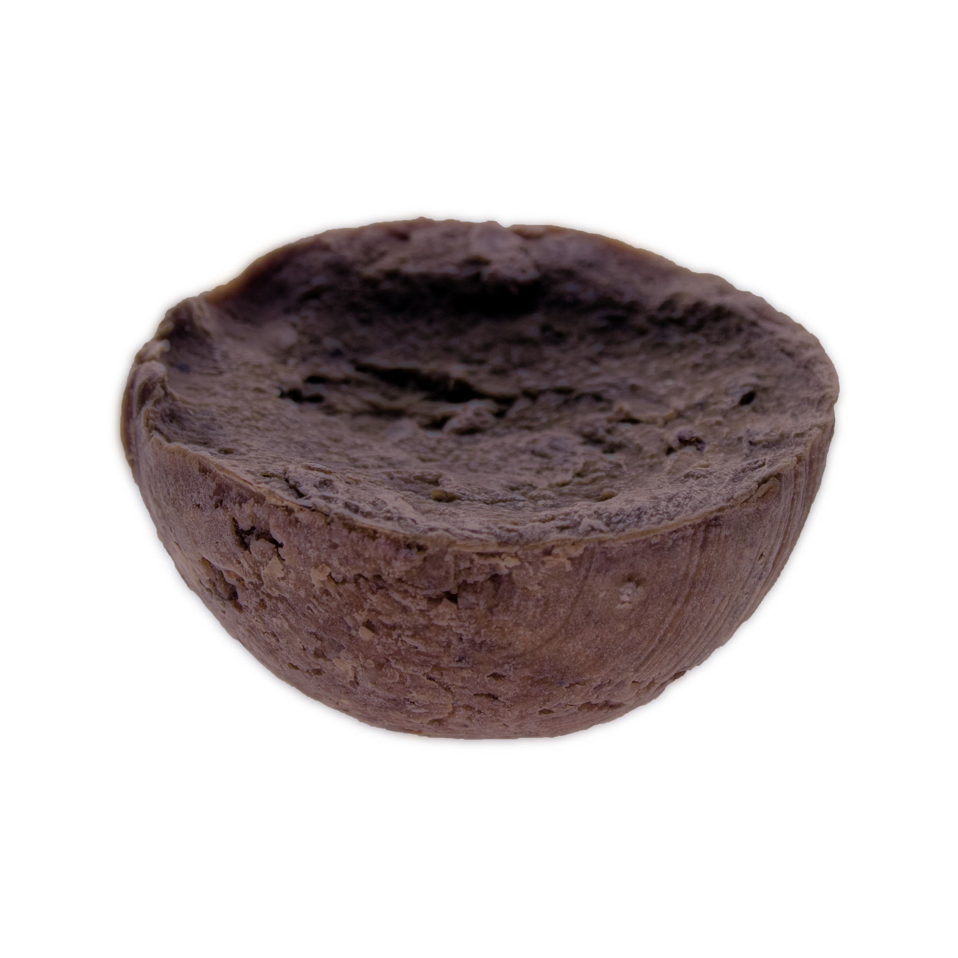 Kaylas Kurlz Organics Whispering Roots Crumble Bar African Black Soap Shampoo half sphere shaped African Black Soap Shampoo bar with a concave face.  It is a placed a against a white background.